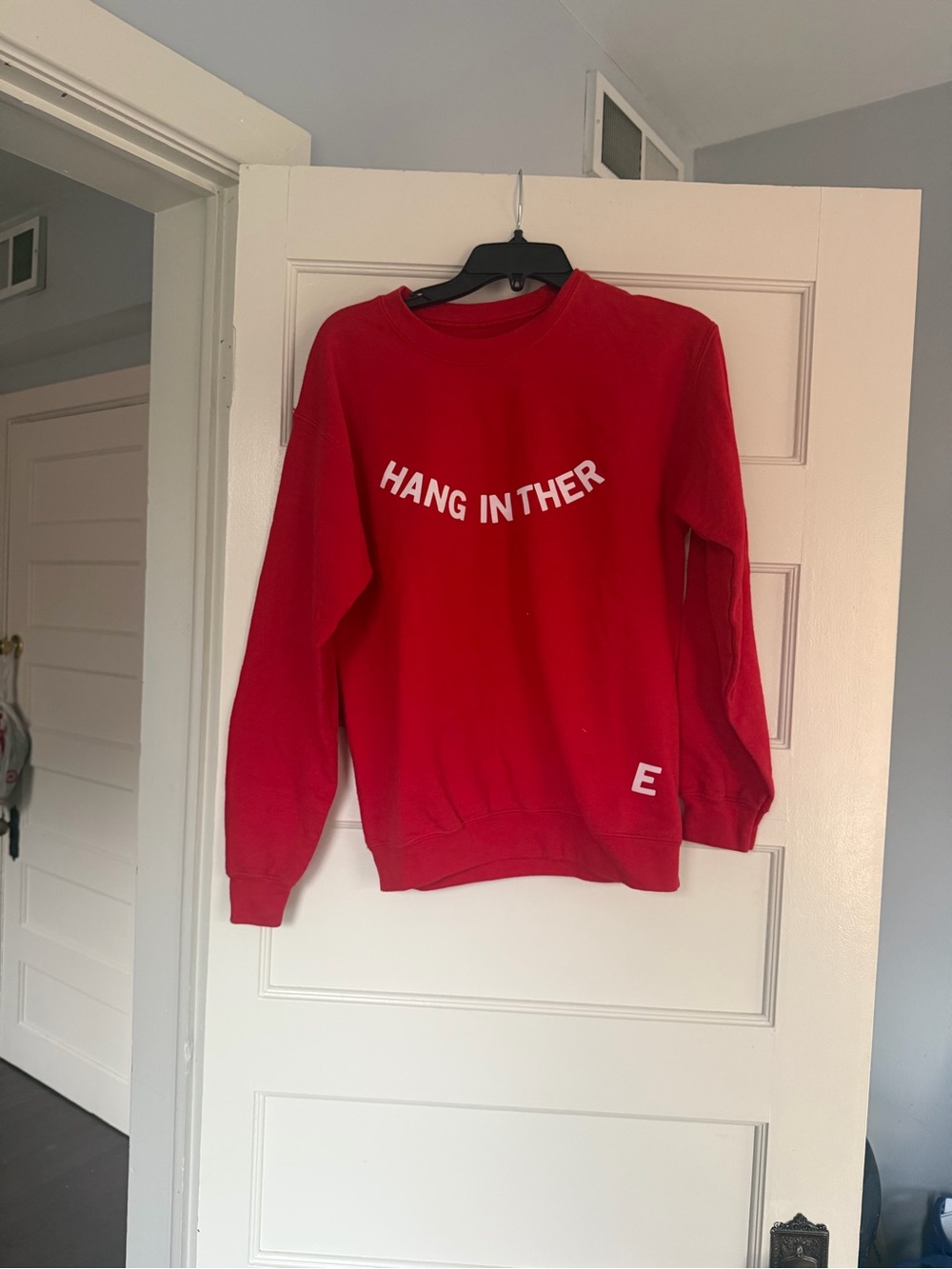 We're Not Really Strangers 'Hang In There' Red Crewneck Sweatshirt